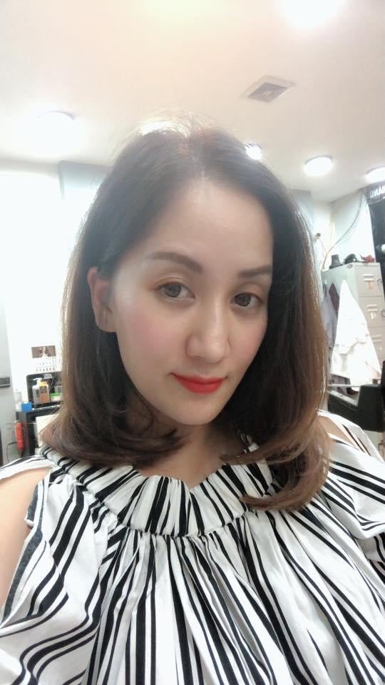 Khánh Thi cắt tóc ngắn sau hai tháng sinh con.