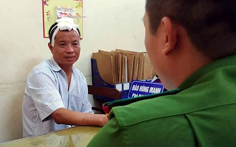 Nghi phạm Tiến tại cơ quan công an.  