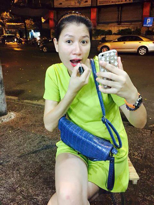Trang Tran khoe bung bau gia gay xon xao du luan