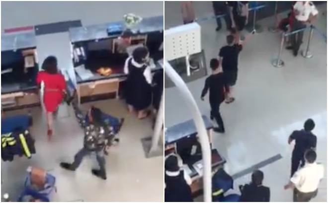 Một nữ nhân viên cũng khác bị đuổi theo đe doạ. Ảnh cắt từ clip.