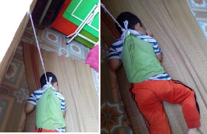 Bé trai 4 tuổi bị buộc dây treo vào cửa sổ ở trường mầm non.