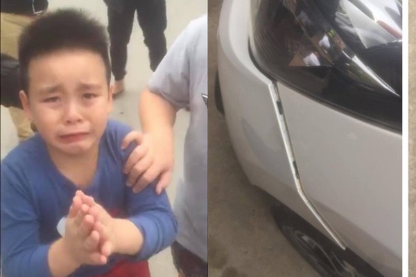 Cậu bé vừa xin lỗi vừa khóc.