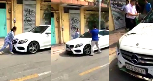 Hình ảnh cụ bà đập phá ô tô tiền tỉ.