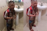Mải bắt cua cá, cậu bé ngã úp mặt xuống ruộng khiến toàn thân đầy bùn nhưng nhìn hình ảnh này mới bất ngờ