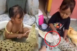 Bé gái thản nhiên ngồi đánh răng cho cá sấu trong bồn tắm nhưng hành động này mới khiến mọi người 'khiếp vía'
