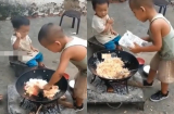 Em gái đói, anh trai 5 tuổi trổ tài chiên cơm vô cùng điêu luyện khiến mọi người không khỏi 'tròn mắt'