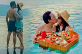 Đi biển phong cách Hari Won, xuống bể bơi cũng trang bị áo dài và mũ nón
