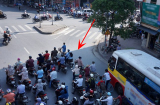 Dừng xe dưới bóng râm chờ đèn đỏ có bị phạt không?