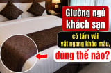 Giường ngủ khách sạn có tấm vải vắt ngang khác màu, dùng thế nào?