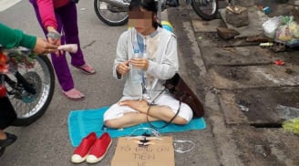 Cô gái ngồi giữa đường xin tiền về Hà Nội: 'Khi thì bắt chước tiếng chó hú,khi nói ú ớ không ra tiếng người'