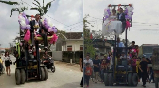 Trần tình của cô dâu chú rể ngồi vắt vẻo trên xe nâng cao quá mái nhà