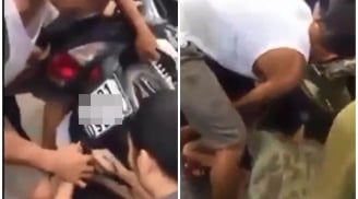Clip cháu bé mặc áo mưa bị cuốn vào bánh xe mẹ nào xem xong cũng hốt hoảng