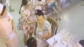 Clip: Sơ suất làm chảy máu bé 2 tuổi, nữ y tá bị ông bố trẻ hành hung ngay chốn đông người