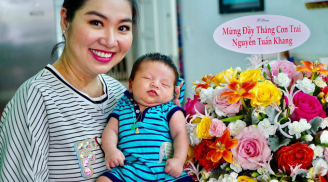 Lê Khánh lần đầu hé lộ ảnh cận mặt con trai giống bố như đúc trong ngày đầy tháng
