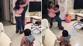 Bố đi công tác bịn rịn ôm mẹ: Phản ứng dễ thương của con gái nhỏ khiến ai cũng phá lên cười